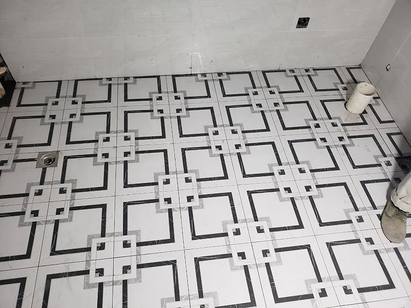 廚衛(wèi)地磚鋪貼：干鋪法是將沙子和水泥按照3：1的比例混合后兌少量的水，使水泥和沙子混合到可以用手攥成團(tuán)的黏稠度。將混合好的沙子水泥鋪在地面上，用一個(gè)平板把表面摸平。在瓷磚背面抹上黏稠度非常高的水泥，把瓷磚放到地面上，用橡皮錘敲實(shí)就完成了,主要用于地面瓷磚的鋪裝。